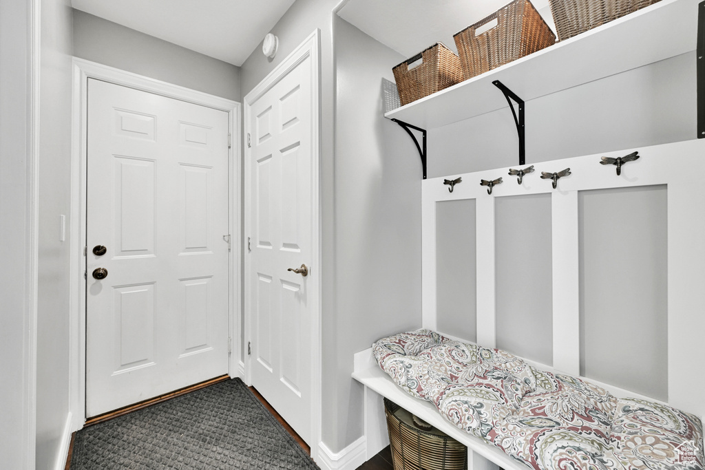Mudroom featuring baseboards