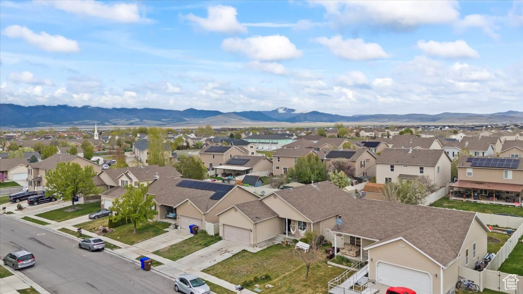 Birds eye view of property featuring a residential view and a mountain view