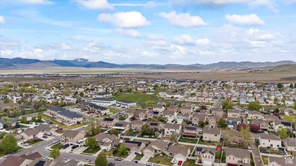 Drone / aerial view featuring a mountain view and a residential view