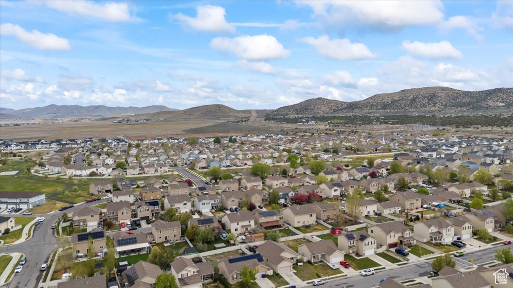 Drone / aerial view featuring a mountain view and a residential view