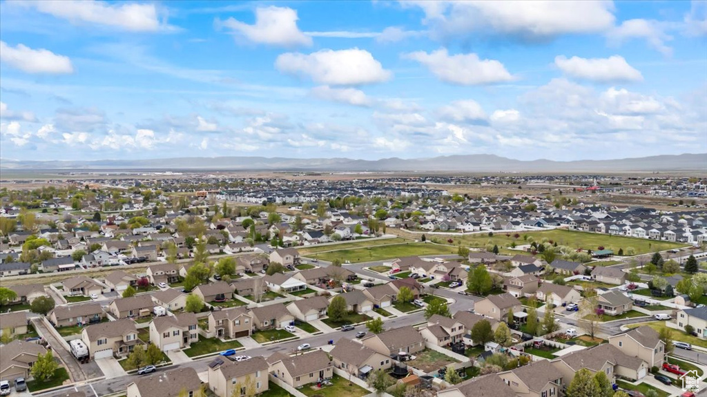 Drone / aerial view featuring a residential view and a mountain view