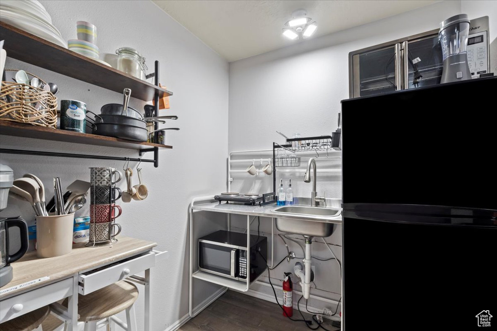 Storage area featuring a sink
