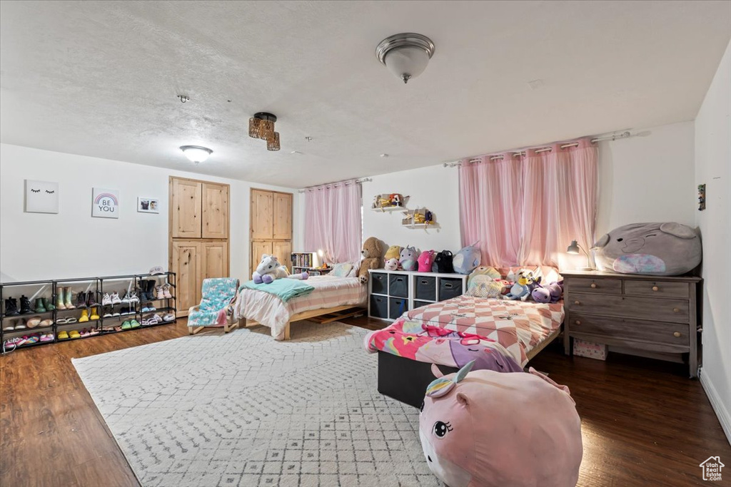 Bedroom featuring wood finished floors