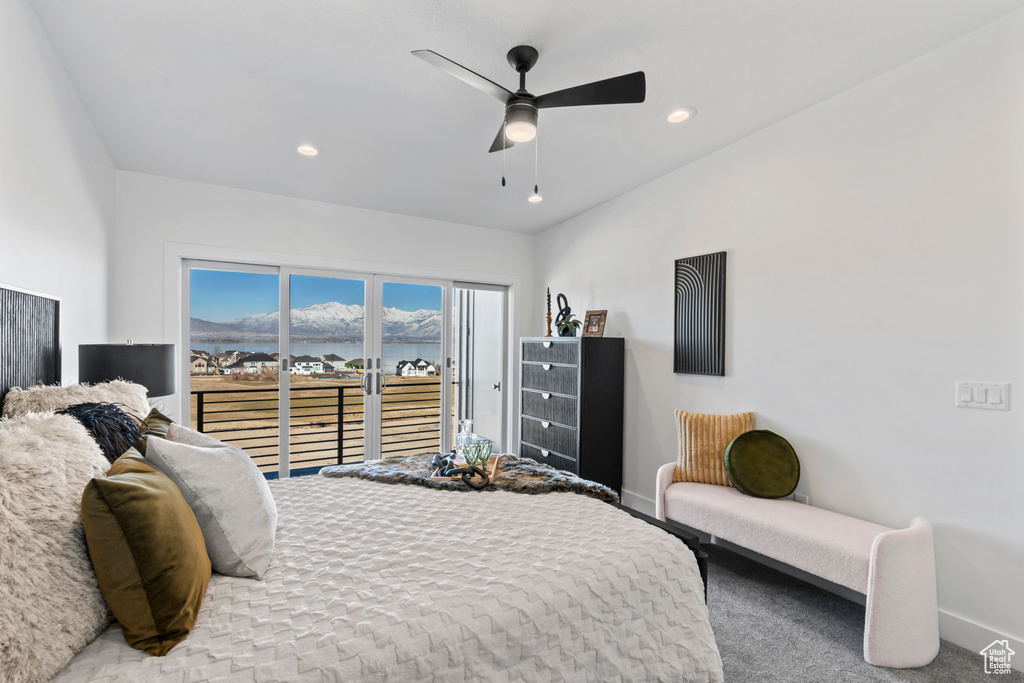 Carpeted bedroom featuring baseboards, recessed lighting, ceiling fan, and access to exterior