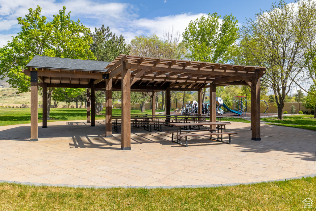 View of property\\\'s community with a pergola and playground community