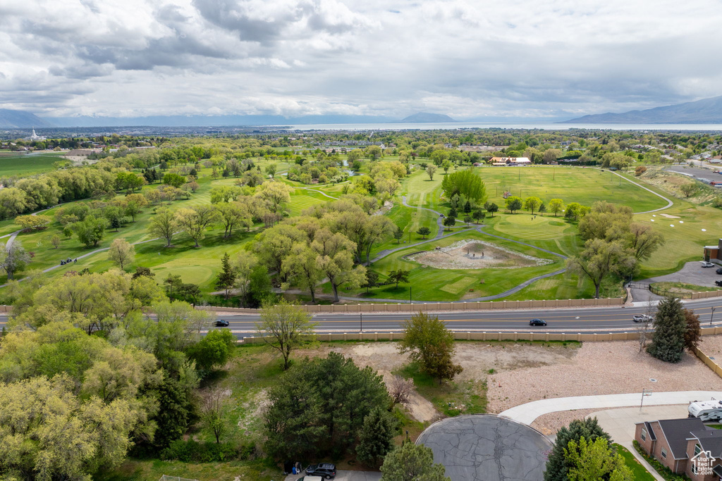 Drone / aerial view with a mountain view and view of golf course