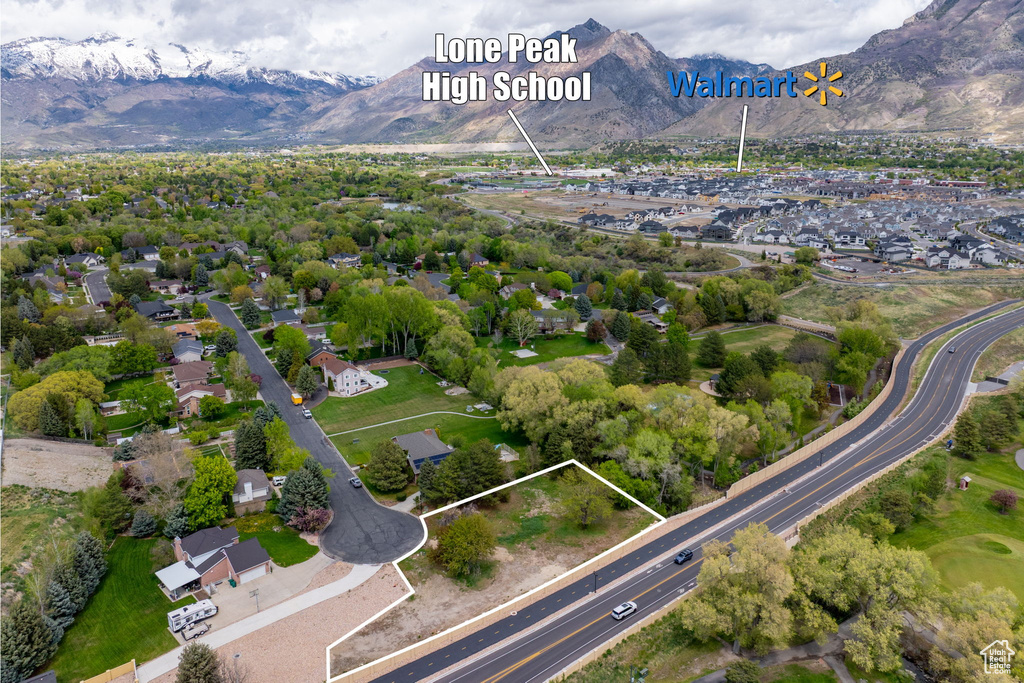 Drone / aerial view featuring a residential view and a mountain view