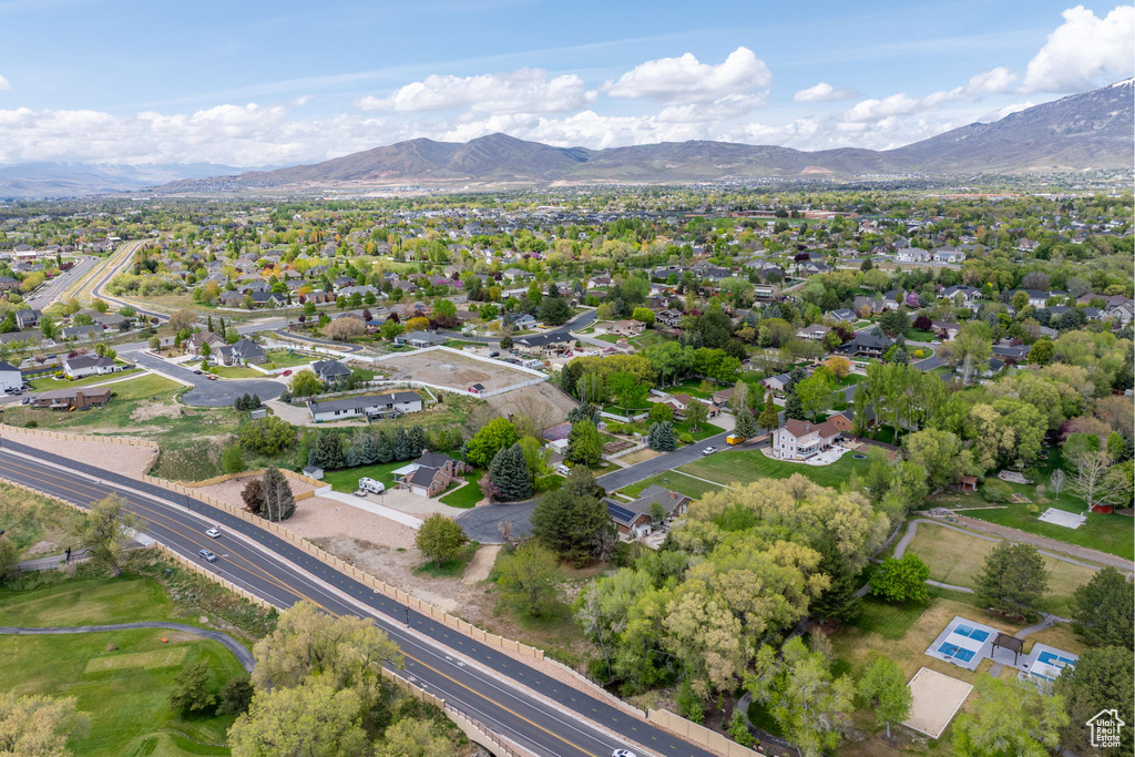 Birds eye view of property featuring a mountain view and a residential view