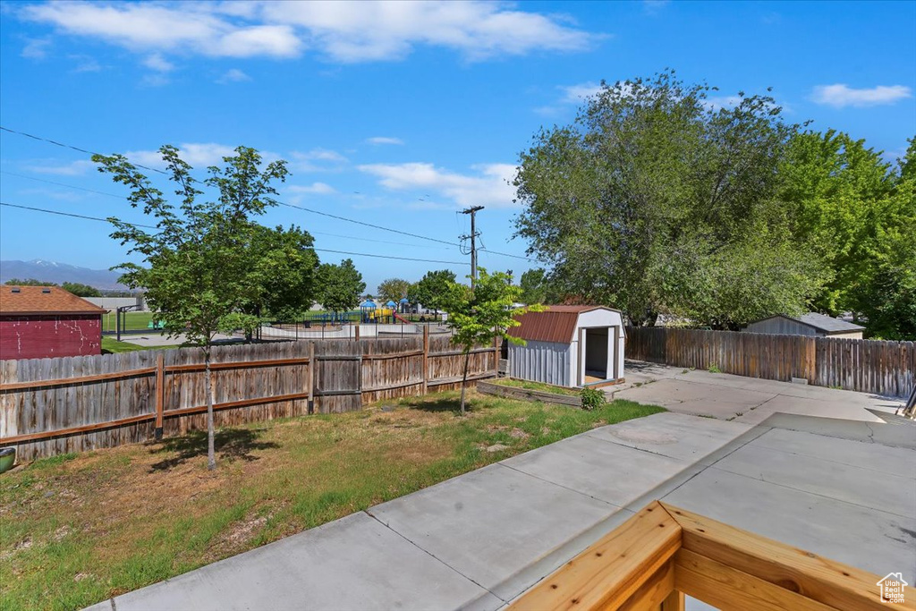 Fenced backyard featuring a patio