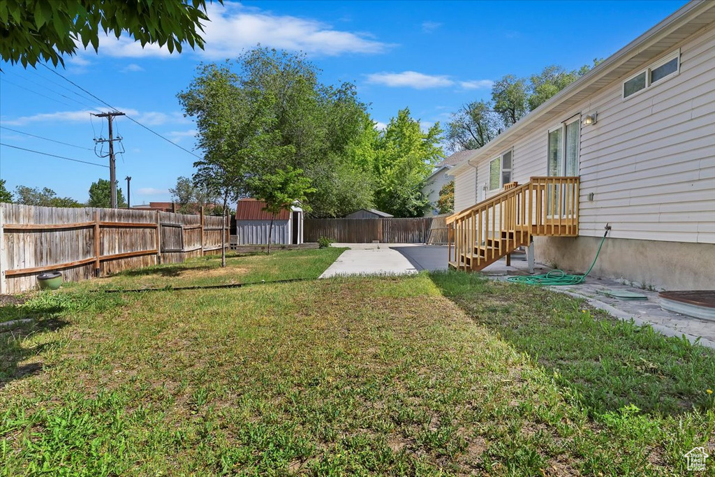 View of yard with a patio