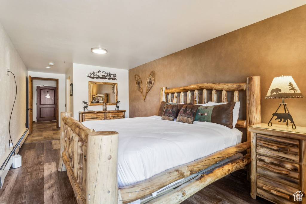 Bedroom featuring wood finished floors