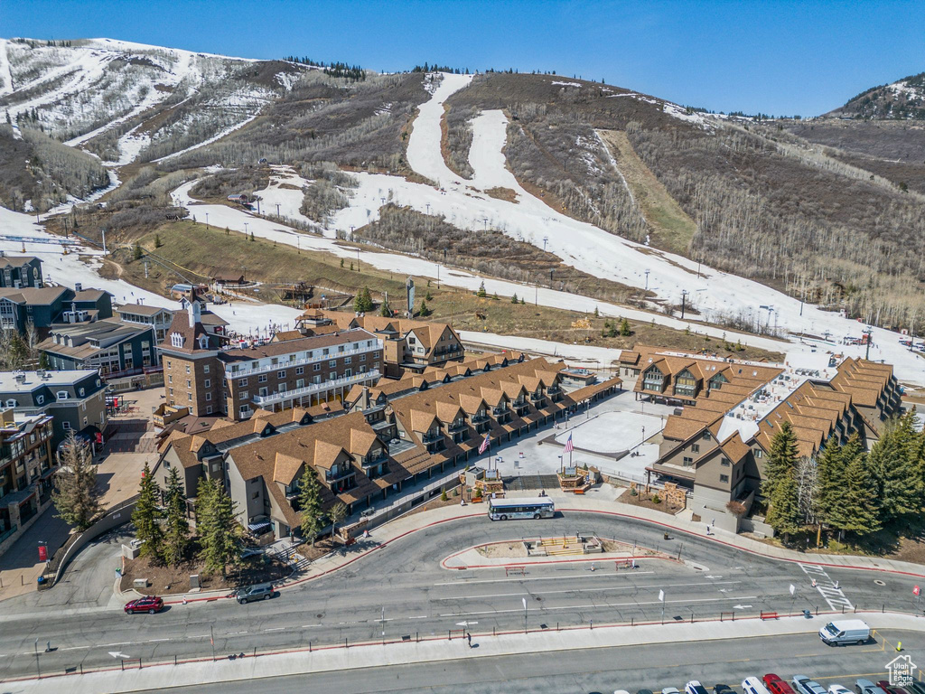 Snowy aerial view with a mountain view