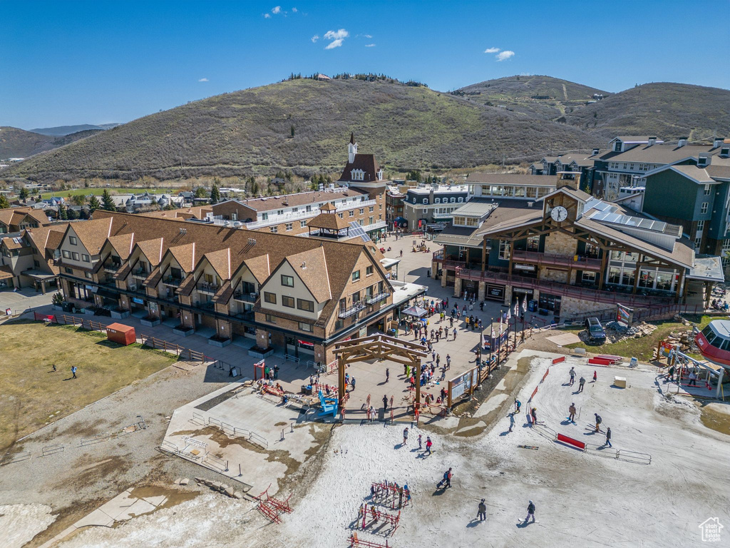 Birds eye view of property with a mountain view