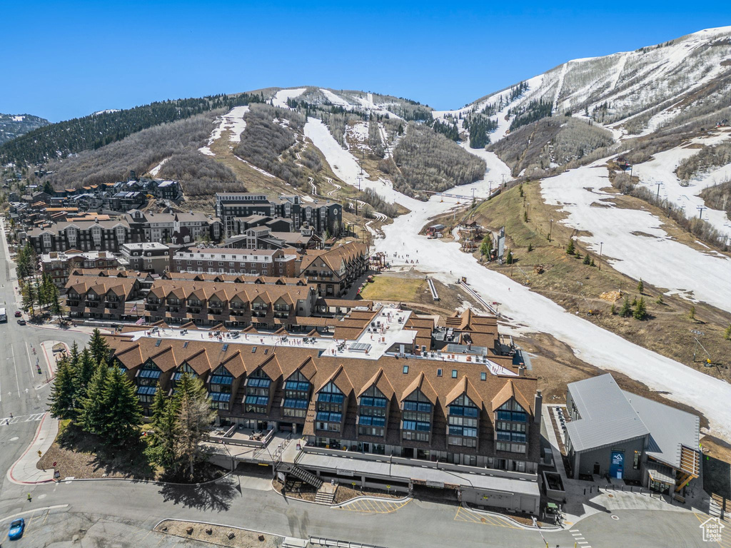 Snowy aerial view featuring a mountain view