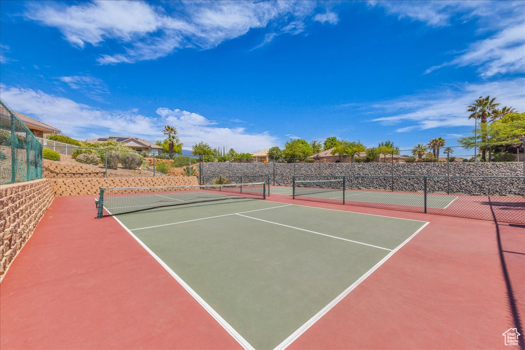 View of sport court with fence and community basketball court