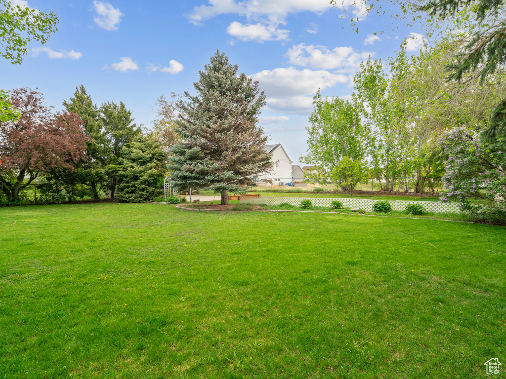 View of yard with fence