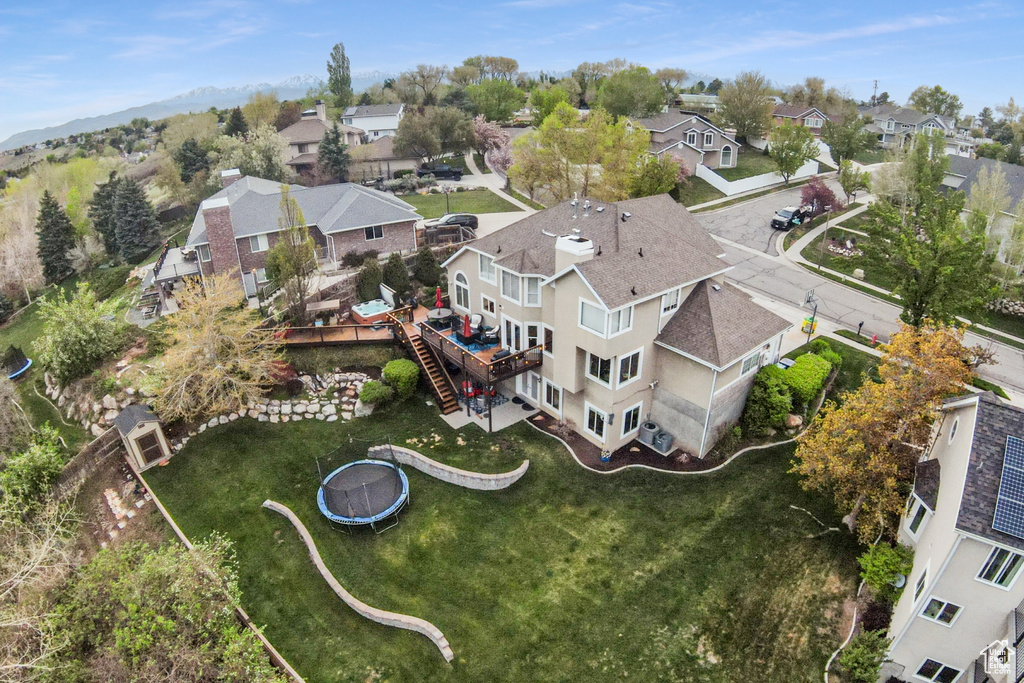 Drone / aerial view featuring a residential view and a mountain view