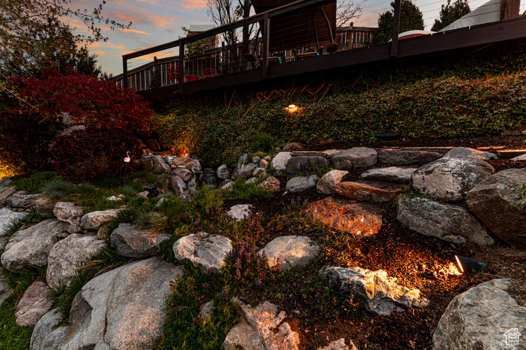 View of yard featuring a wooden deck