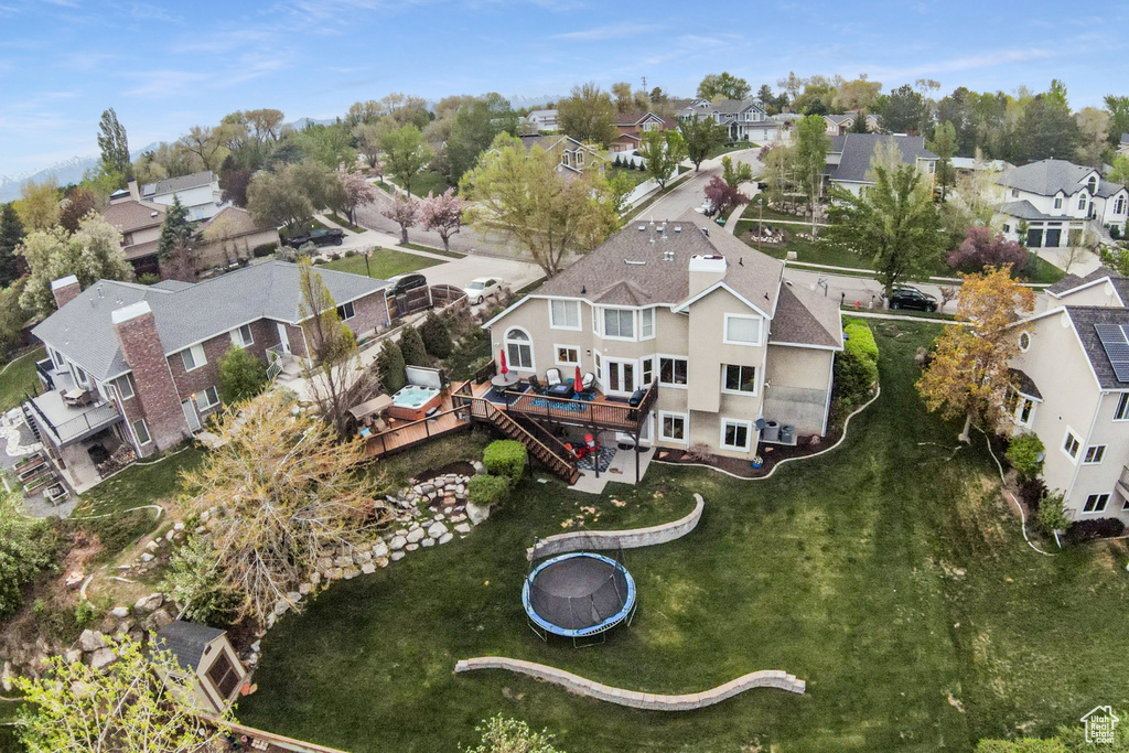 Birds eye view of property with a residential view
