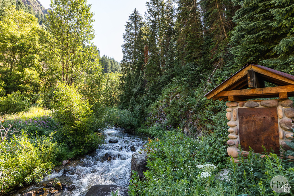 Exterior space with a wooded view