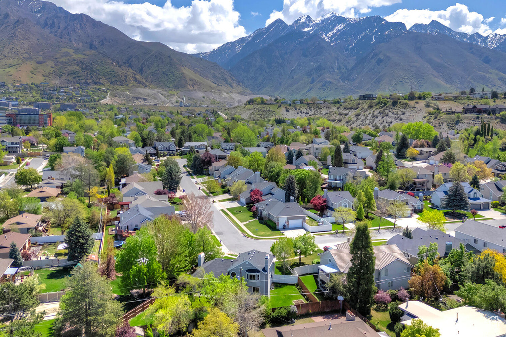 Drone / aerial view with a mountain view and a residential view