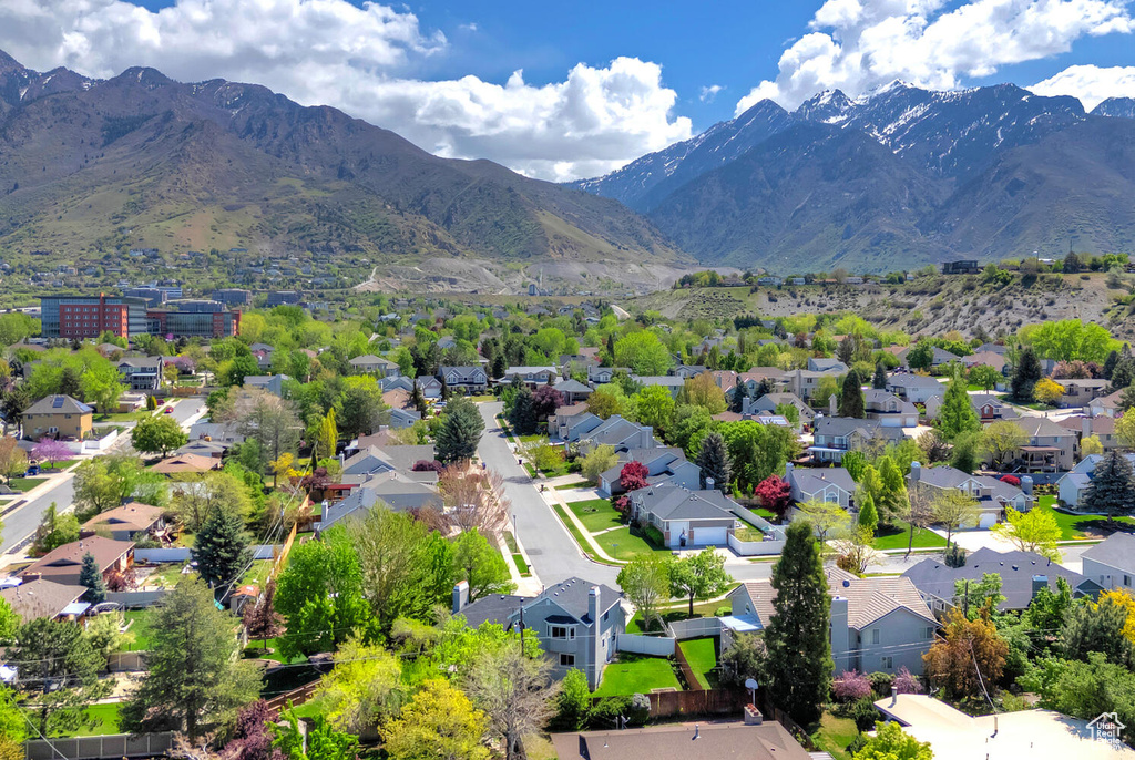 Drone / aerial view featuring a mountain view and a residential view