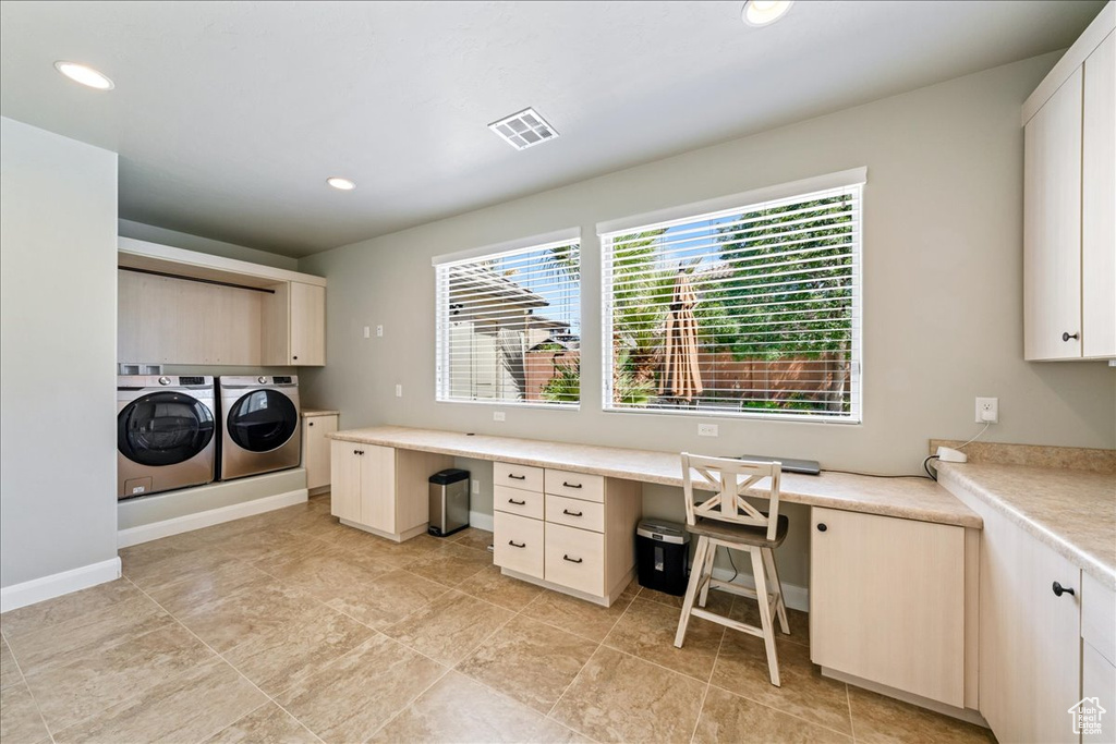 Laundry room featuring visible vents, recessed lighting, cabinet space, and washing machine and clothes dryer