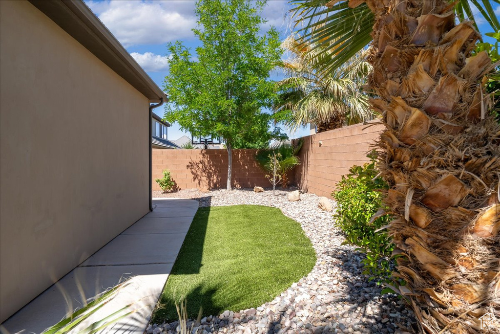 View of yard featuring a fenced backyard