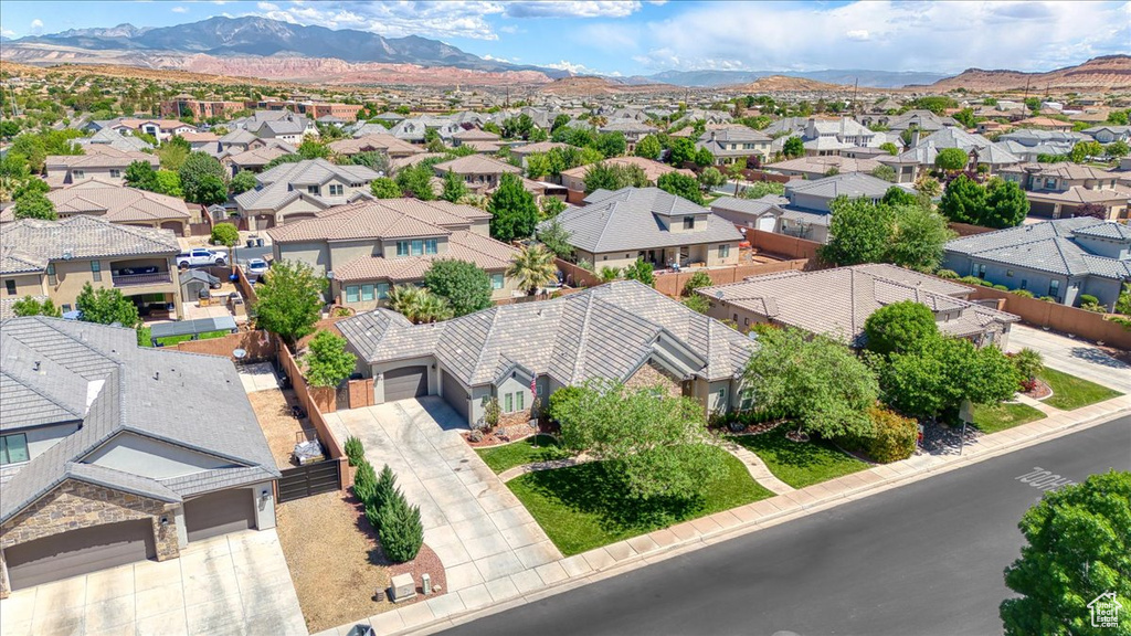 Birds eye view of property featuring a residential view and a mountain view