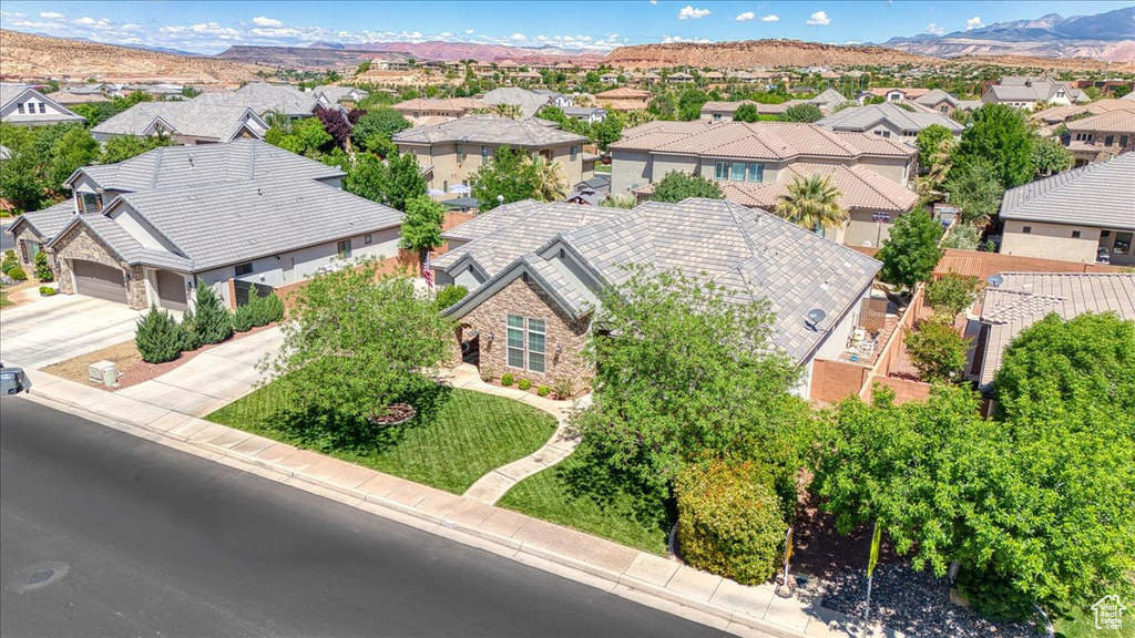 Aerial view featuring a mountain view and a residential view