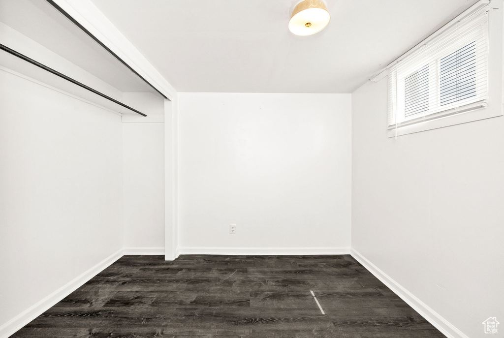 Interior space featuring dark wood-style floors