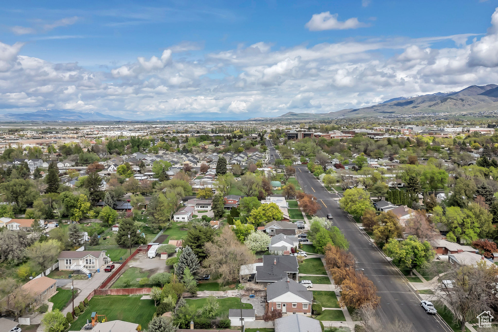 Drone / aerial view featuring a mountain view and a residential view