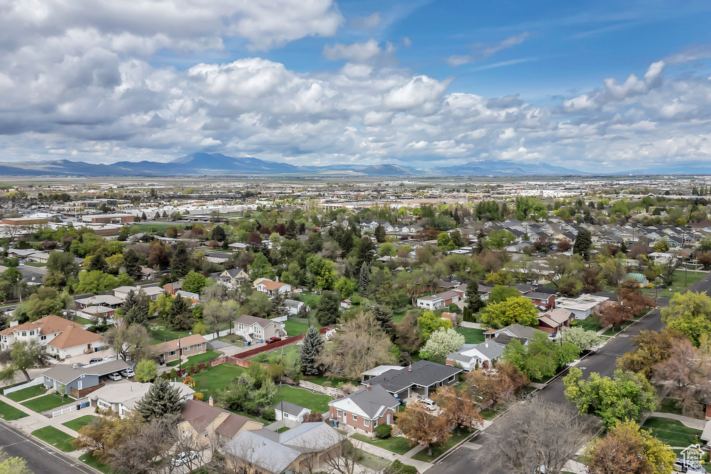 Drone / aerial view featuring a mountain view and a residential view