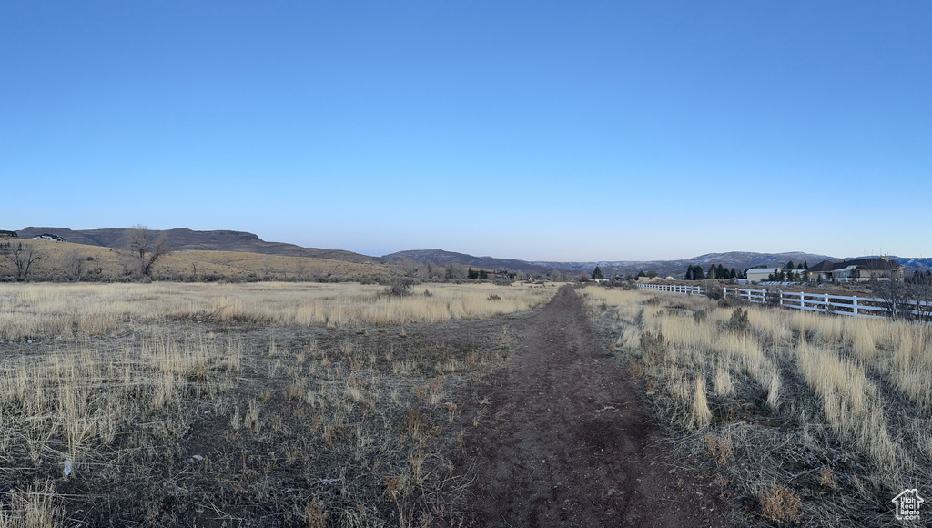 Property view of mountains featuring a rural view