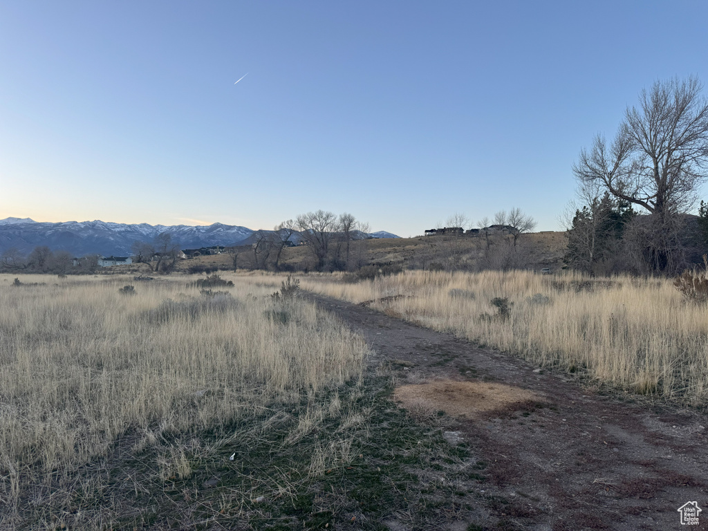 Exterior space with a rural view and a mountain view