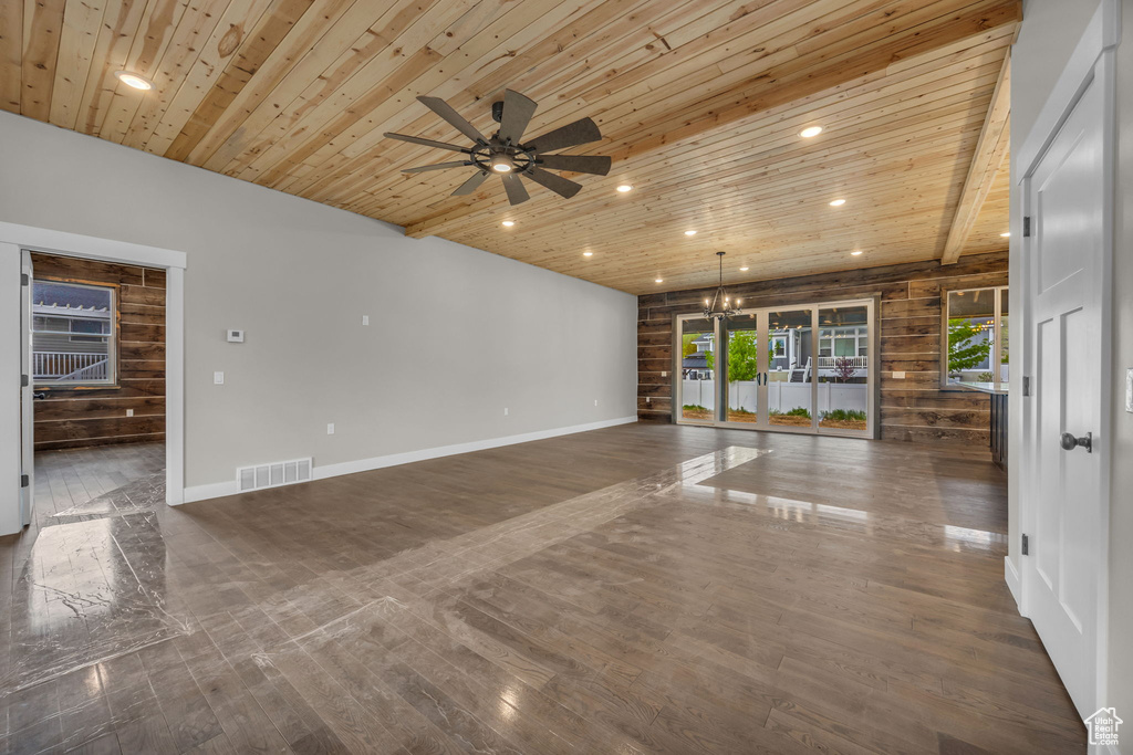 Unfurnished living room featuring recessed lighting, ceiling fan, visible vents, and wood ceiling