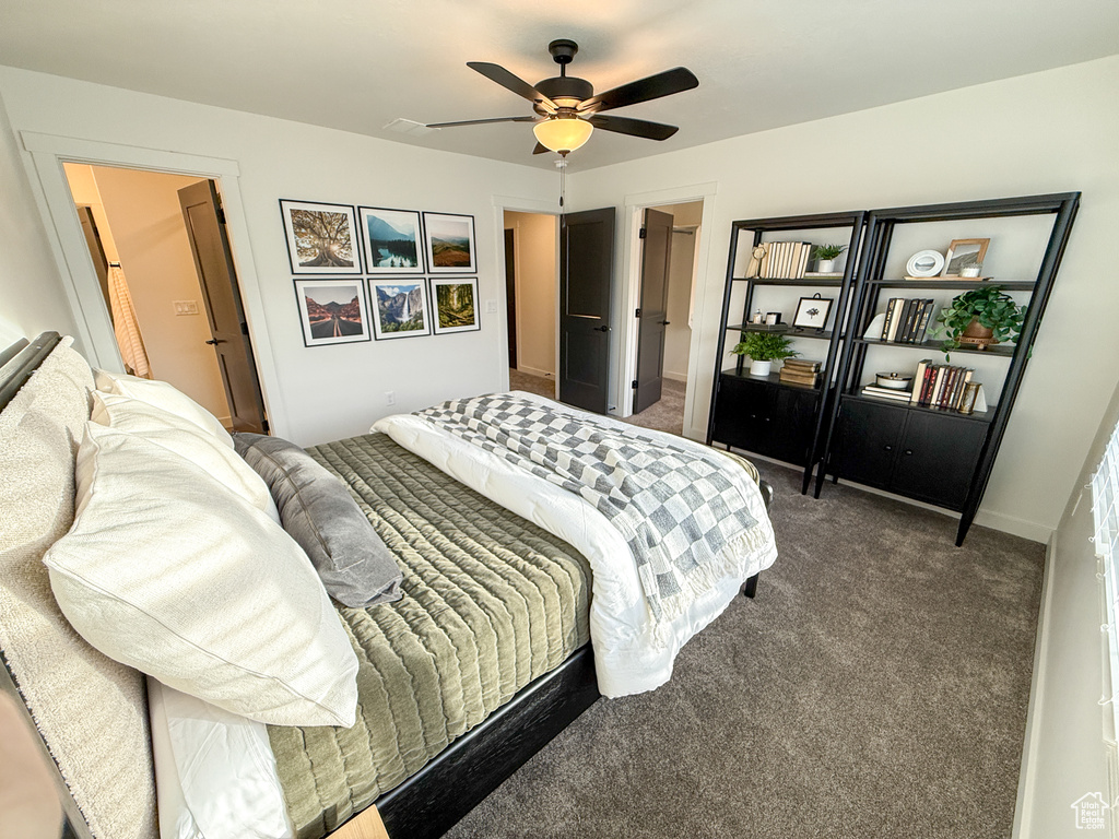 Bedroom featuring carpet floors and ceiling fan