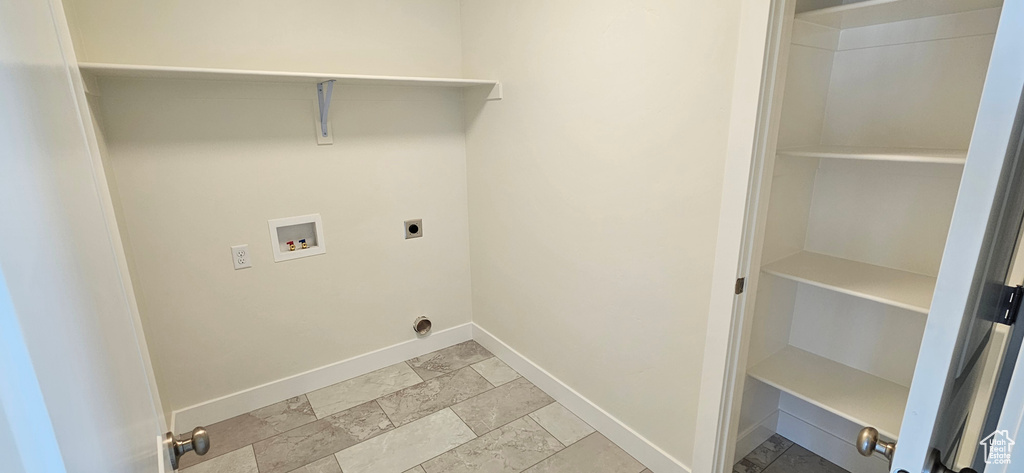 Laundry area with hookup for a washing machine and electric dryer hookup