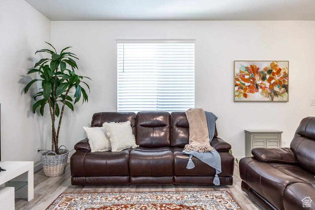Living area with wood finished floors
