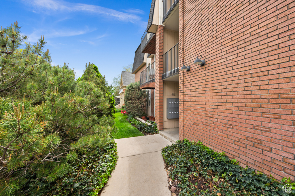 View of side of property with brick siding