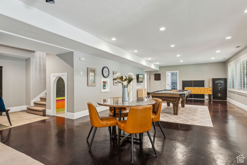 Rec room featuring recessed lighting, baseboards, and wood finished floors