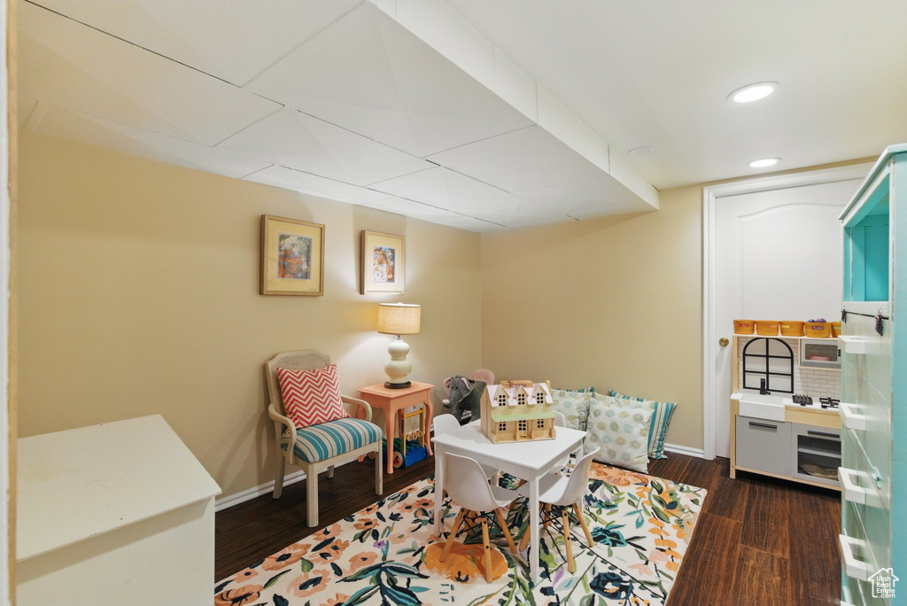 Sitting room featuring baseboards, recessed lighting, and wood finished floors