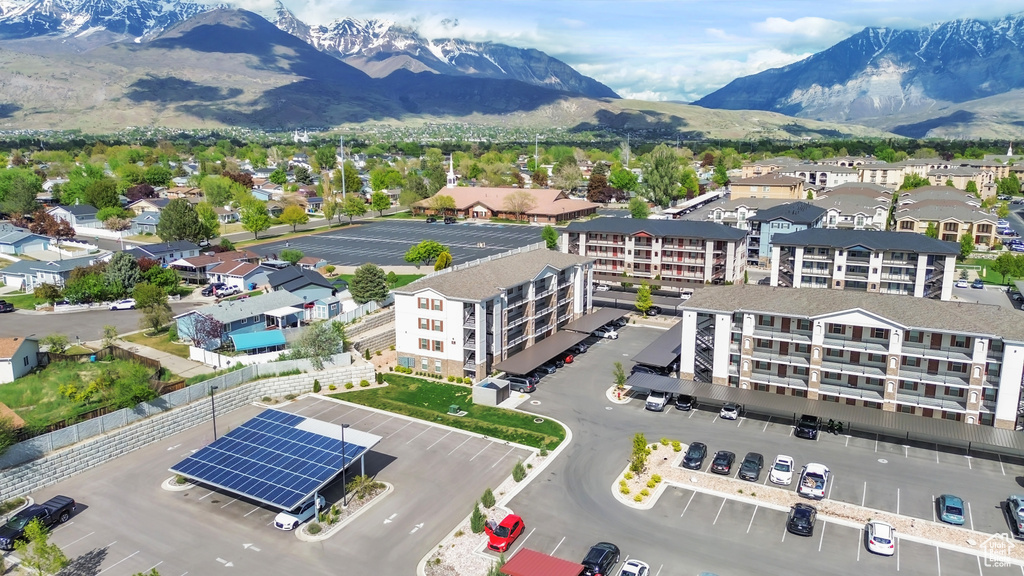 Birds eye view of property with a mountain view