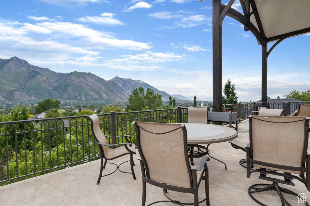 View of patio with a mountain view