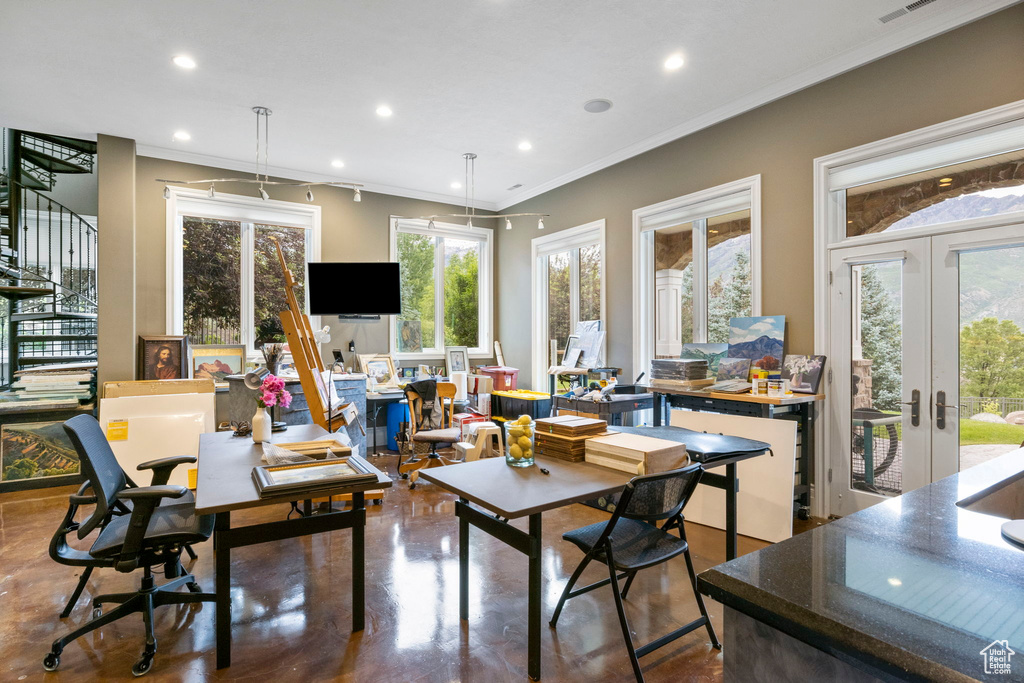 Dining area featuring recessed lighting, crown molding, and french doors
