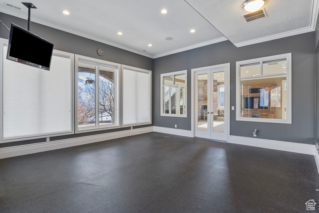 Spare room with baseboards, french doors, recessed lighting, and visible vents