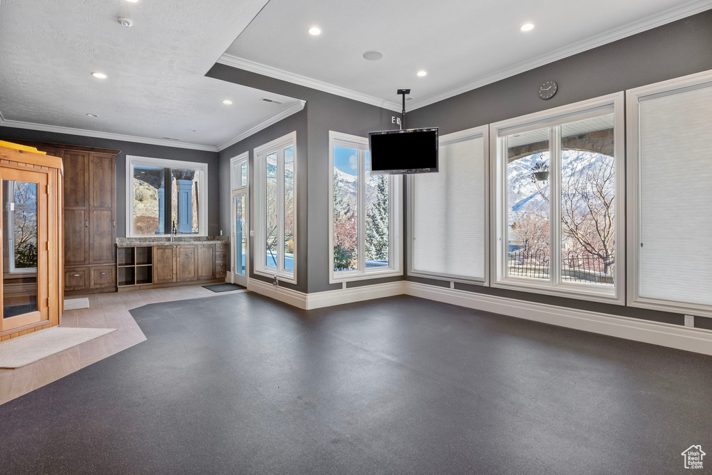 Interior space featuring recessed lighting, baseboards, and a healthy amount of sunlight