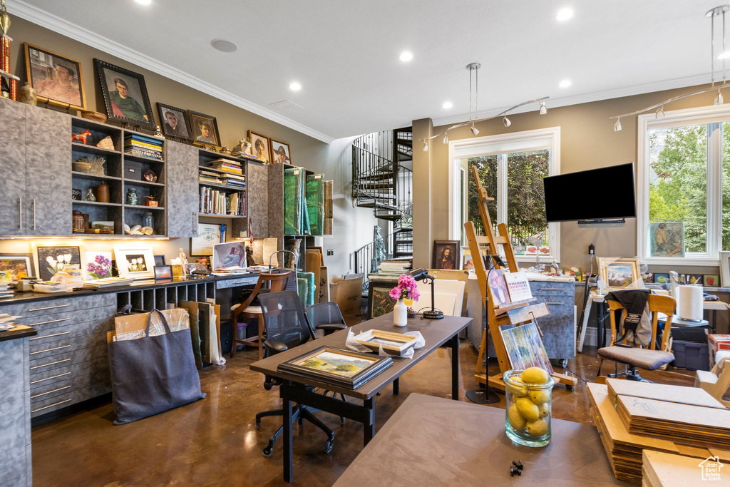 Home office featuring concrete flooring, recessed lighting, and ornamental molding