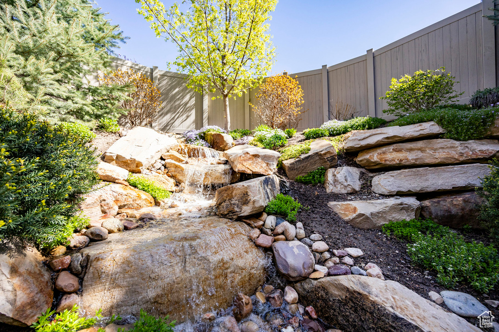 View of yard with fence