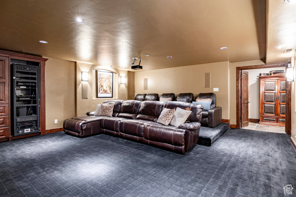 Cinema featuring visible vents, baseboards, wine cooler, carpet flooring, and recessed lighting